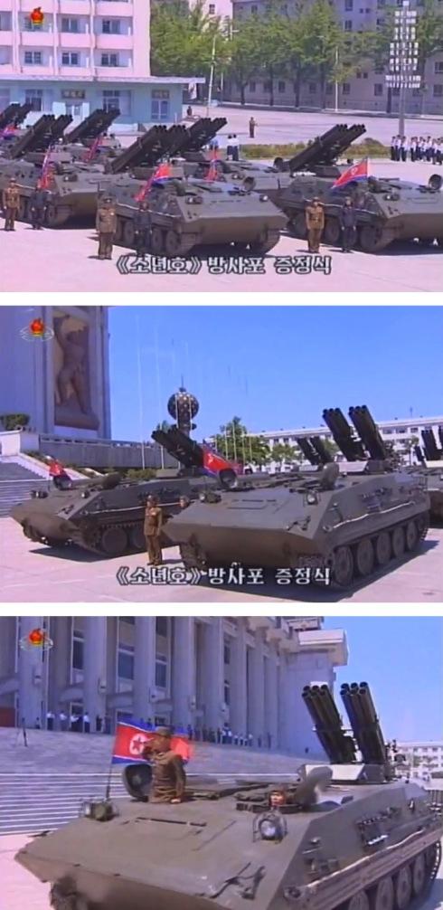 Sonyonho multiple rocket launch systems [MRLS] are paraded by the Hamhu'ng Grand Theater for delivery to KPA units, after a 1 June 2013 ceremony at which Korean Children's Union members donated the MLRS to the KPA (Photos: KCTV screengrabs)