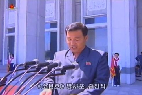 Kim Il Sung Youth League Chairman Jon Yong Nam delivers a speech at a ceremony held to donate MLRS to KPA units in Hamhu'ng, South Hamgyo'ng Province on 1 June 2013 (Photo: KCTV screengrab)