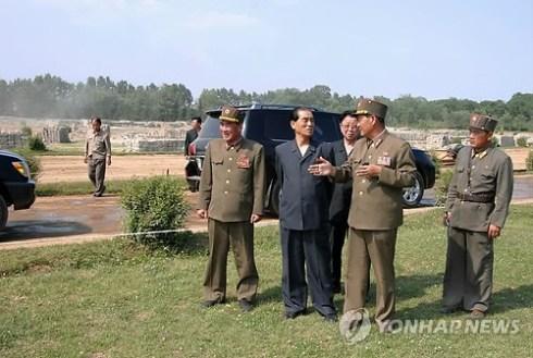 DPRK Cabinet Premier Pak Pong Ju (2nd L) is briefed about the renovation and construction work at Mirim Riding Club in east Pyongyang.  Also seen in attendance is DPRK Vice Premier and State Planning Commission Chairman Ro Tu Chol (3rd L)(Photo: KCNA-Yonhap).
