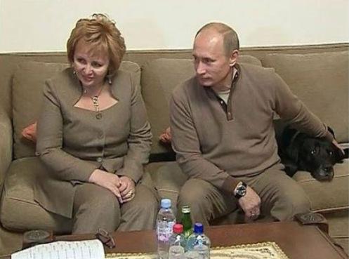 The Putin's with their older dog, Conny.