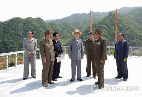 Kim Yong Nam (4th L), the DPRK's official head of state as President of the Supreme People's Assembly Presidium, tours the Masik Pass Ski Ground on 9 June 2013 (Photo: KCNA-Yonhap)