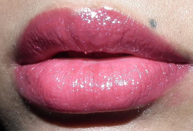 A Plum Shade Based Gloss With Shimmer
