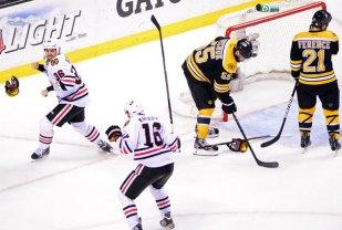 Until the fat lady sings: Just 17 seconds earlier, a game seven seemed certain, but Dave Bolland (36 in white) reminded us all that it truly ain't over until it's over.