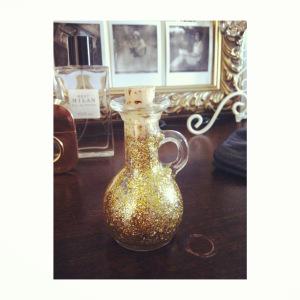 So firstly, I found an amazing bottle whilst eating out, and not (sneakily) bringing it home was not an option....I must say, I wasn't quite rebel enough to take it myself, so thanks to my cousin! It is now Filled with gold fairy dust and sits with some Polaroids. 