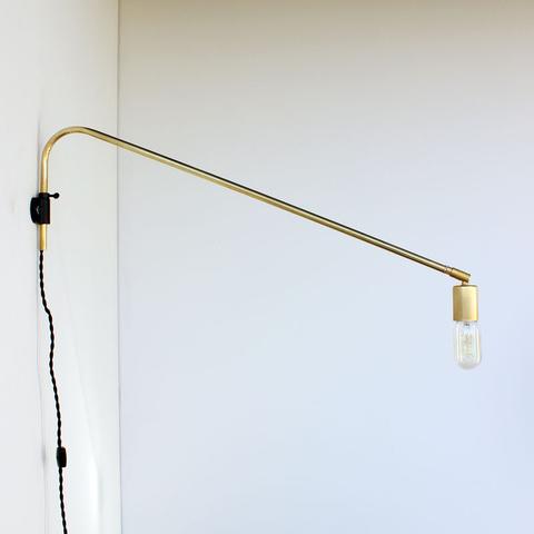 Brass swing arm wall mounted lamp by Onefortythree