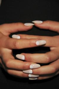 The half-moon manicure. Not quite nail art, but this shows extreme attention to detail