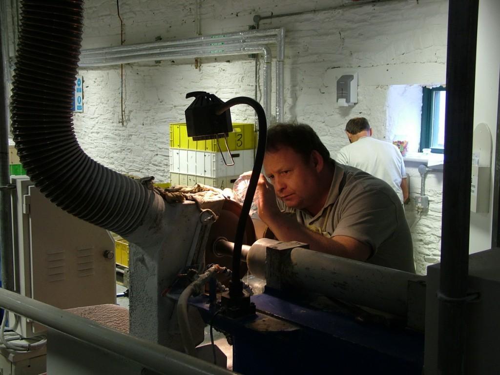 Our tour of the House of Waterford Crystal in Ireland cutting a crystal glass - waterford crystal - ireland