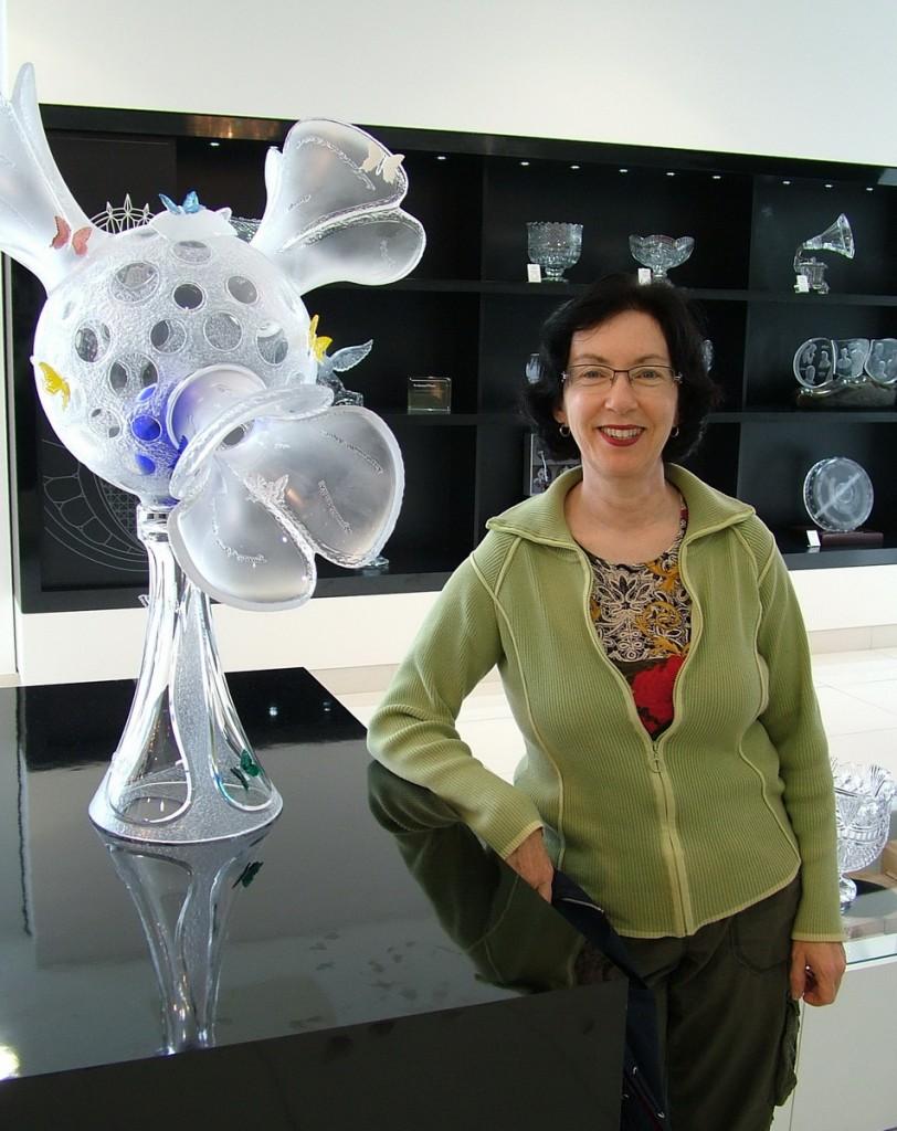Our tour of the House of Waterford Crystal in Ireland jean stands beside waterford crystal display - house of waterford crystal - ireland