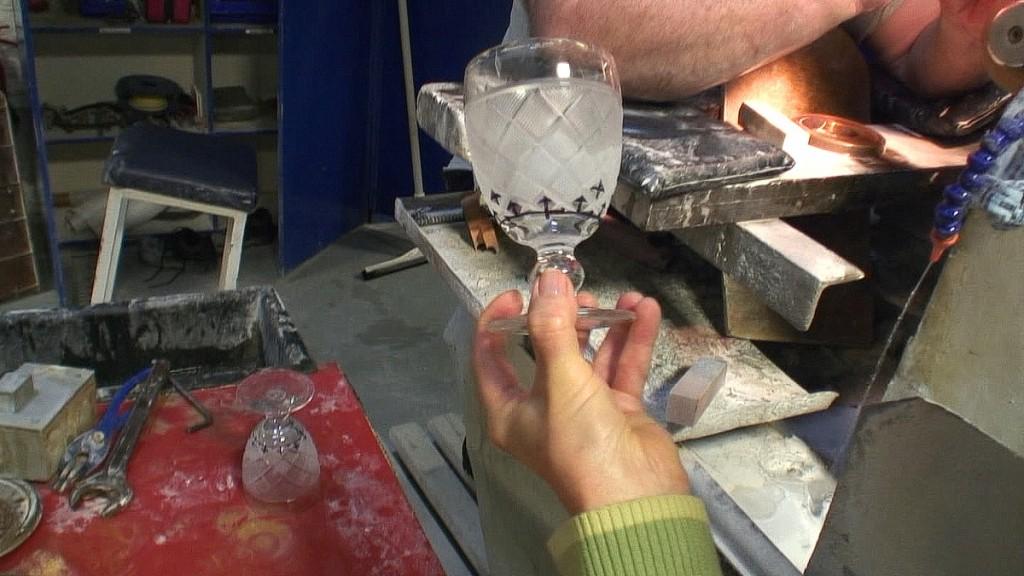 Our tour of the House of Waterford Crystal in Ireland jean holds a crystal glass in cutting room - house of waterford crystal - waterford - ireland