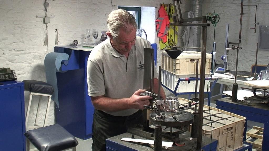 Our tour of the House of Waterford Crystal in Ireland hand marking a crystal glass - house of waterford crystal - ireland