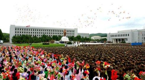 A view of participants at a ceremony unveiling a statue of late DPRK leader Kim Jong Il at the KJI University of People's Security in Pyongyang on 19 July 2013 (Photo: Rodong Sinmun).