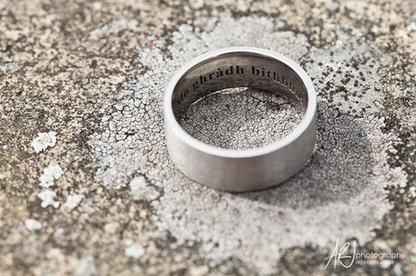 The wedding rings are both engraved Andy 39s in and I guess celtic script