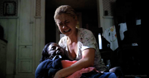 Sookie holds a wounded Tara in her arms in the season 4 finale of True Blood