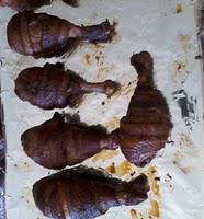 Recipe for Smoked Drumsticks Wrapped in Bacon and Rolled in a Hot Wings Sauce
