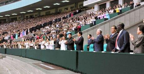 Kim Jong Un, senior DPRK officials and heads of foreign government delegations applaud during a national report meeting commemorating the 60th anniversary of the termination of active hostilities of the Korean (Fatherland Liberation) War at May Day Stadium in Pyongyang on 26 July 2013.  Among those seen in attendance is Kim Kyong Hui (R), eldest daughter of the late DPRK President and founder Kim Il Sung (Photo: Rodong Sinmun).