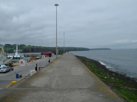A Visit to Dunmore East, Ireland Had Us Feeling At Home stormy clouds over harbor at dunmore east in county waterford - ireland