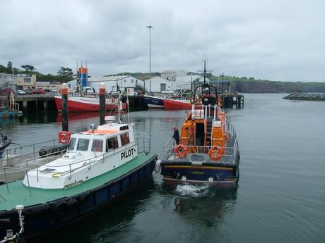 A Visit to Dunmore East, Ireland Had Us Feeling At Home lifeboat and pilot boat leave dunmore east harbor in county waterford - ireland