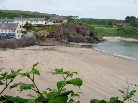 A Visit to Dunmore East, Ireland Had Us Feeling At Home a sandy beach in dunmore east in county waterford - ireland