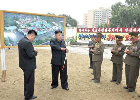 Kim Jong Un Visits Construction of Mirim Riding Club and Munsu Wading Pool Kim Jong Un (2nd L) issues instructions about the construction of the Munsu Wading Pool in Pyongyang. Also seen in attendance is architect and leading construction manager, KWP Department Deputy Director Ma Won Chun (L) (Photo: Rodong Sinmun).