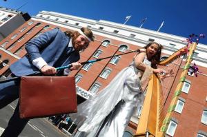 Extraordinarily original acts at the Edinburgh Fringe yesterday Ursula, on stilts, plays her harp in Belfast