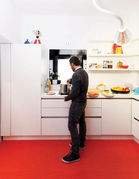 Modern kitchen with orange rubber floor