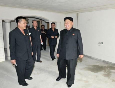 Kim Jong Un (R) tours a residential unit in one of two apartment towers earmarked for KIS University science faculty and researchers.  Also seen in attendance is architect and party construction boss Ma Won Chun (L) (Photo: Rodong Sinmun).