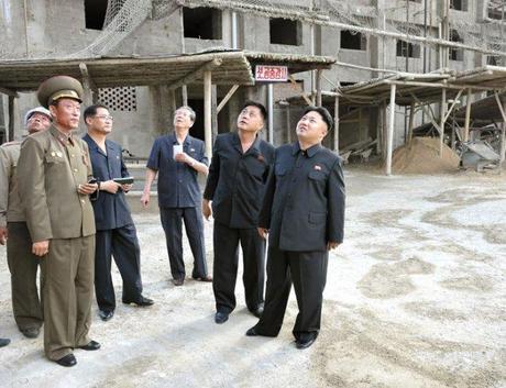 Kim Jong Un tours the premises of two apartment towers designated for Kim Il Sung University science faculty and researchers (Photo: Rodong Sinmun).