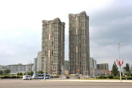 Two apartment towers under construction by KPA Unit #267.  The apartments are designated for KIS University science faculty and researchers (Photo: Rodong Sinmun).