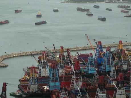 Container ships parked during Typhoon Utor