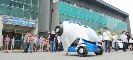 Korean Engineers Unveil Armadillo-T, a Foldable Compact Electric Car This light and compact electric car completely folds in half when parking, which makes it a perfect fit for public or private transportation in an urban environment. (Credit: KAIST)