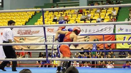 DPRK Women Boxers Finalists at 3rd Taiwan Invitational Tournament Australia's Bianca Elmir (red) fighting against the DPRK RI Kwang Suk (blue) in Taipei on 18 August 2013.