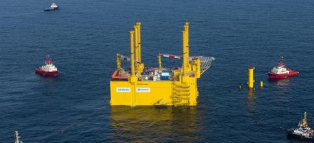 Siemens Installs 576 MW North Sea Offshore Converter Station After the HVDC platform HelWin1 reached its setup zone a further four days were required for installation. HelWin1 is a floating jack-up platform that is moved to the desired position by tugboats with its supports raised. When it reaches this position, the supports are lowered and connected to the supporting structure that has already been installed. The platform is then raised using a hydraulic jacking system. (Credit: Siemens AG, Munich/Berlin)