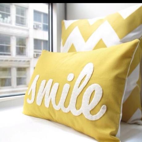 smile pillow Extend Summer with Pops of Yellow in Your Decor!