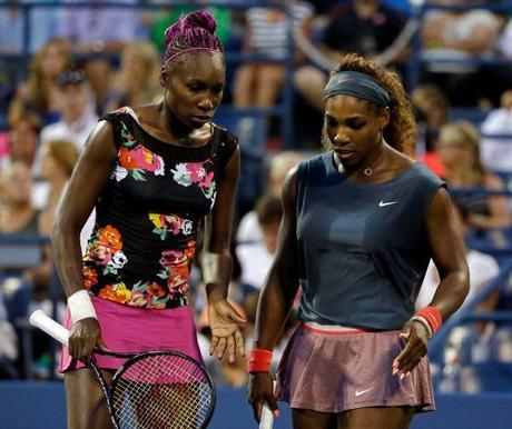 Serena and Venus Williams play doubles at the 2013 US Open