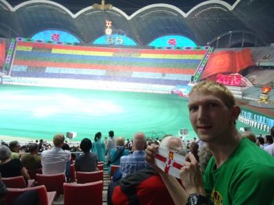 Watching the Mass Games on National Day in the May Day Stadium, Pyongyang, North Korea northern ireland flag mass games