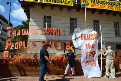 Activists Banner Drop and Lock Down at US Trade Rep Building to Expose TPP Negotiations StopTPP3