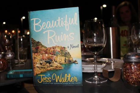 Our First Ever Book Club! My beautiful book next to my empty glass of wine (oops!)