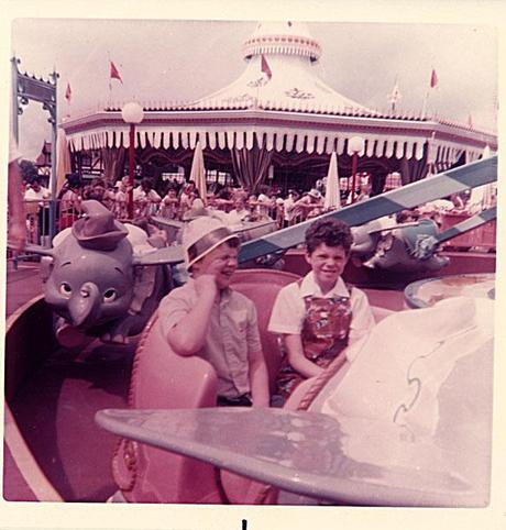 Two children on the Dumbo ride, Disney World, 1973