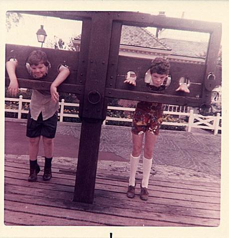 Two children in stocks, Disney World, 1973