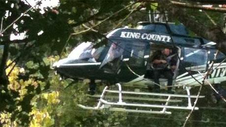 Image: King County, Wash., deputies hover over a suspected gunman Saturday