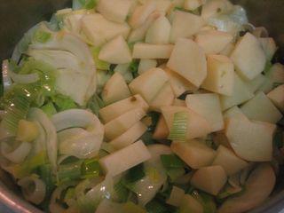 Saute leeks and add potatoes