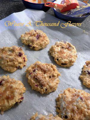 Pumpkin Cranberry Scones - Drizzle brown sugar on scones & rest