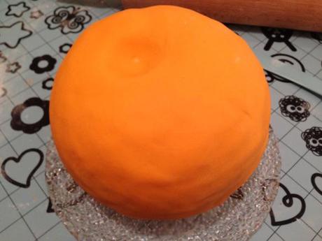 sphere cake spiced pumpkin covered in orange fondant for halloween