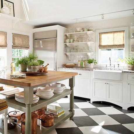 Bold patterned tile makes a statement in this light and airy kitchen. See more ideas for kitchen floors: http://www.bhg.com/kitchen/flooring/fresh-ideas-for-kitchen-floors/?socsrc=bhgpin042413patterntile=4