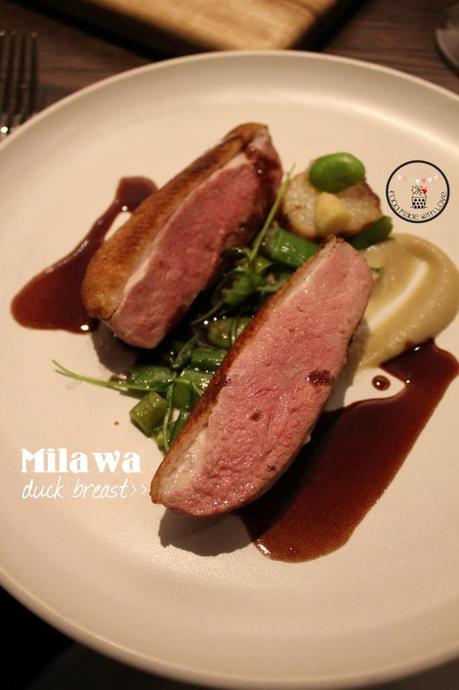 Milawa duck breast with shallot puree, asparagus and peas