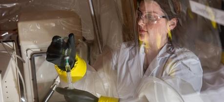 Jennifer Glass works in a chamber where she can control the oxygen levels to mimic the deep sea environment.