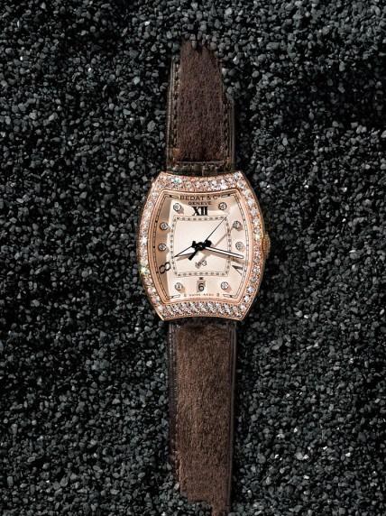 Bedat & Co.  “No. 3” watch in 18k rose gold with diamond bezel on brown alligator and mink fur strap. Automatic. Switzerland. Fur from Denmark and chrome-tanned. $31,750.