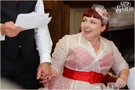 Julia & Chris Got Married! | Wedding Photography bride holding the hand of groom during speeches at vintage themed wedding in yorkshire