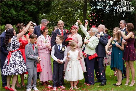 Julia & Chris Got Married! | Wedding Photography Red heart confetti at vintage wedding