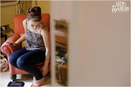Julia & Chris Got Married! | Wedding Photography Bridesmaid puts on shoes Yorkshire
